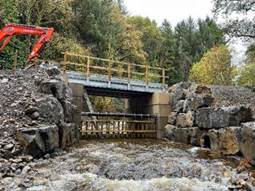 A bridge over a river
AI-generated content may be incorrect.